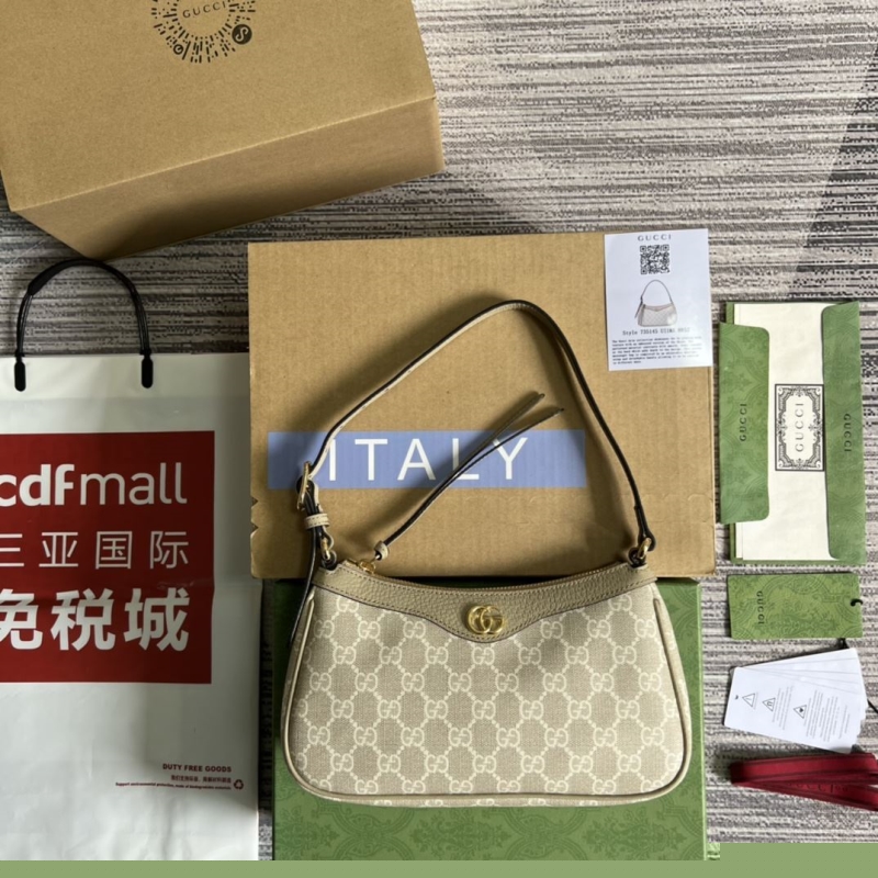 G*u*i top handle bags
